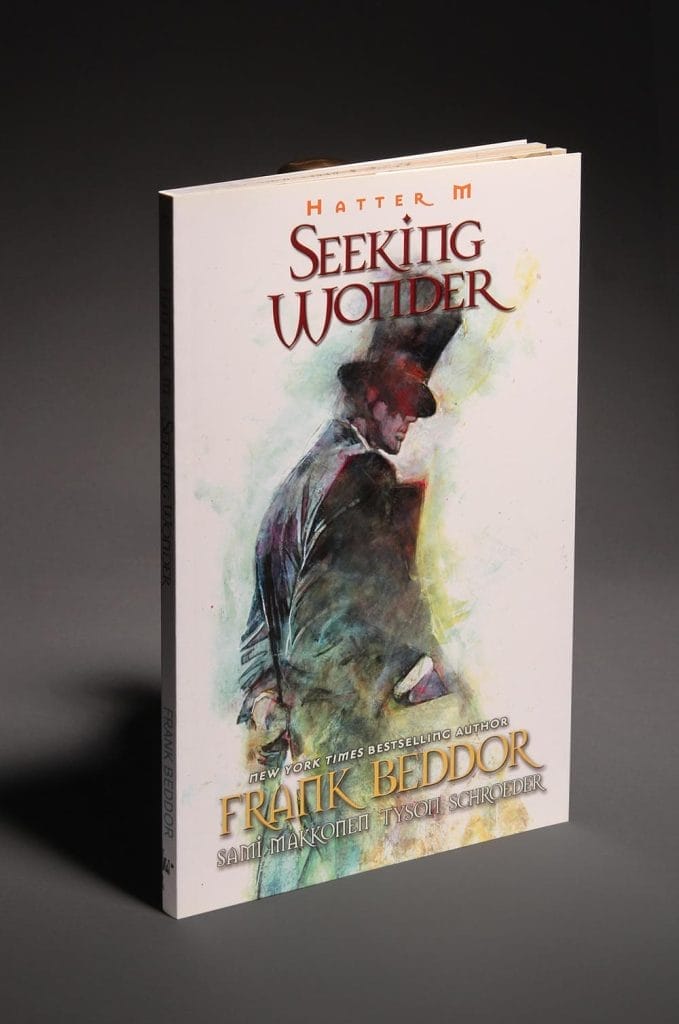 The book photographed against a grey backdrop.