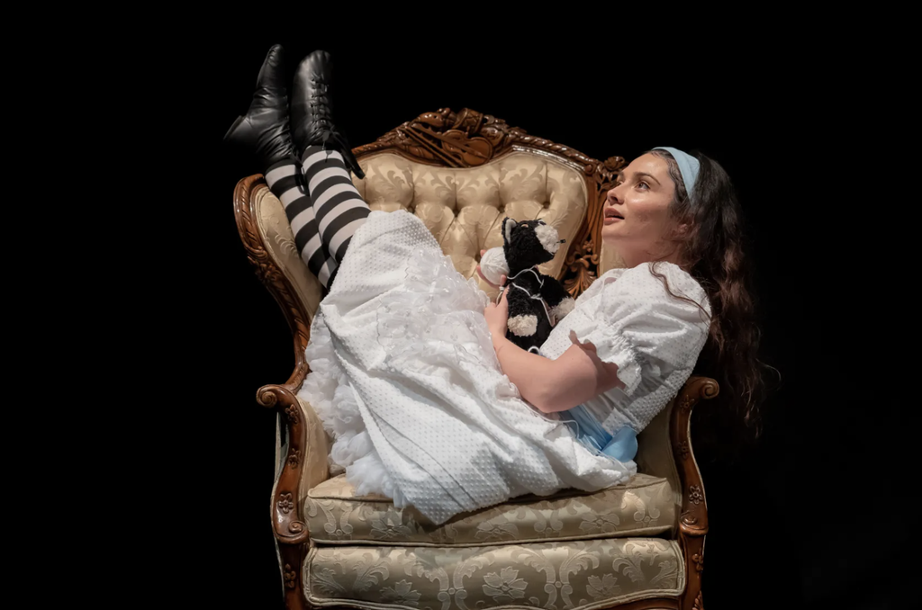 Image of actor Molly Hernández as Alice in "Lookingglass Alice" at the Lookingglass Theatre in Chicago.