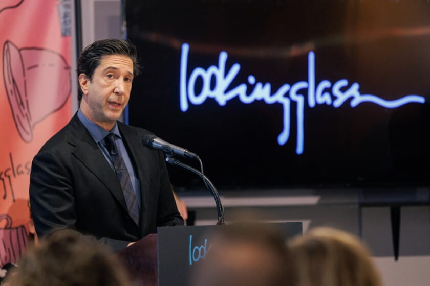 Image of David Schwimmer giving a speech at the Lookingglass Theatre Company in Chicago. 