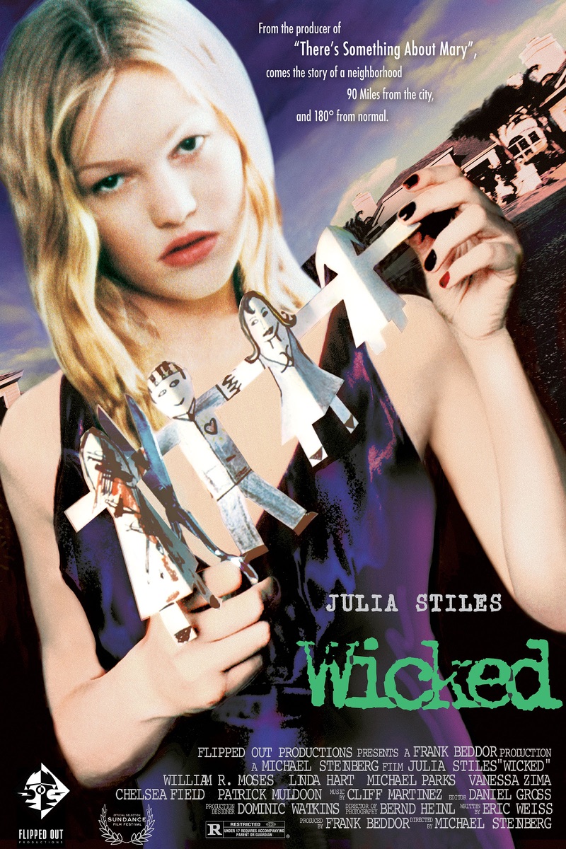 The one-sheet. Julia Stiles as Ellie stares out over a
                    chain of paper dolls she holds against her chest &mdash; a
                    mother, a father and two children, the father&rsquo;s figure
                    slashed through with a knife in red crayon. Her nails are
                    painted black, the sky behind her is bruised purple, and her
                    name sits above the title. Across the top: &ldquo;From the
                    producer of &lsquo;There&rsquo;s Something About
                    Mary&rsquo;, comes the story of a neighborhood 90 miles from
                    the city, and 180&deg; from normal.&rdquo;