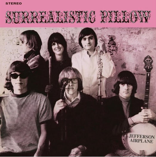Jefferson-Airplane-Surrealistic-Pillow-album-cover-featuring-black-and-white-photo-of-the-band-members-Grace-Slick-Jack-Cassady-Marty-Balin-Paul-Kantner-Jorma-Kaukonen-and-Spencer-Dryden-with-a-pink-hue-overlay