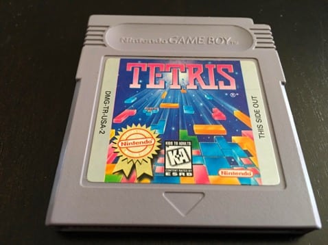 Tetris-cartridge-for-original-Nintendo-game-boy-video-games-family-bonding-experience-gaming-handheld-device-pop-culture-relevance