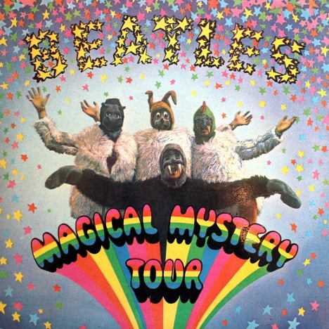 A group of people in Walrus costumes. Album cover of The Beatles 1967 album: "Magical Mystery Tour". Drawing. paralells between Alice in Wonderland and their songs: "Lucy in the Sky With Diamonds", and "I am the Walrus", by John Lennon. 