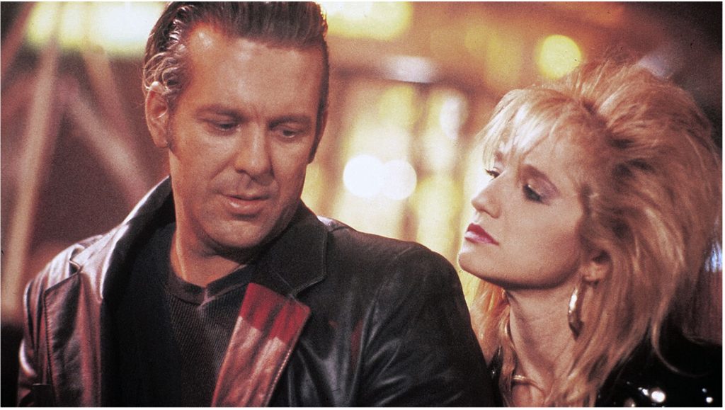 Image from Johnny Handsome, a 1989 feature film, starring Mickey Rourke, Ellen Barkin and Elizabeth McGovern. 