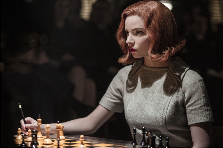 Image from the Queen's Gambit, starring Anya Taylor Joy. Here she is in character, playing chess. 