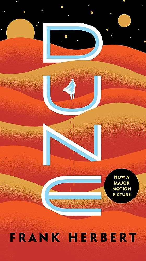 Book Cover for Frank Herbert's "Dune", featuring a cartoonish night sky, with 2 moons and multiple waves of sandy dunes in red, yellow and orange hues. 