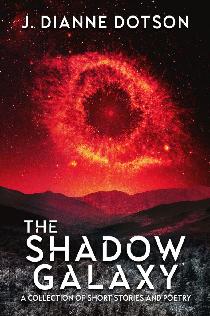 Book cover for "The Shadow Galaxy - A collection of short stories and poetry" by J. Dianne Dotson. This cover is a black and white mountain valley, with a dark red, starry sky, where the galaxy above looks like a human eye. 