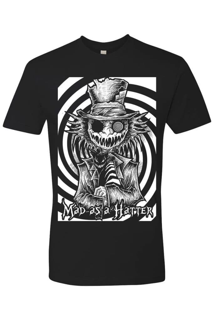 A black t-shirt with a cartoon character mad hatter from Lewis Carroll's Alice's Adventures in Wonderland. This is an extra-spooky black and white cartoon version, with a black and white spiral background that is hypnotizing. The text at the bottom reads: "Mad as a Hatter".