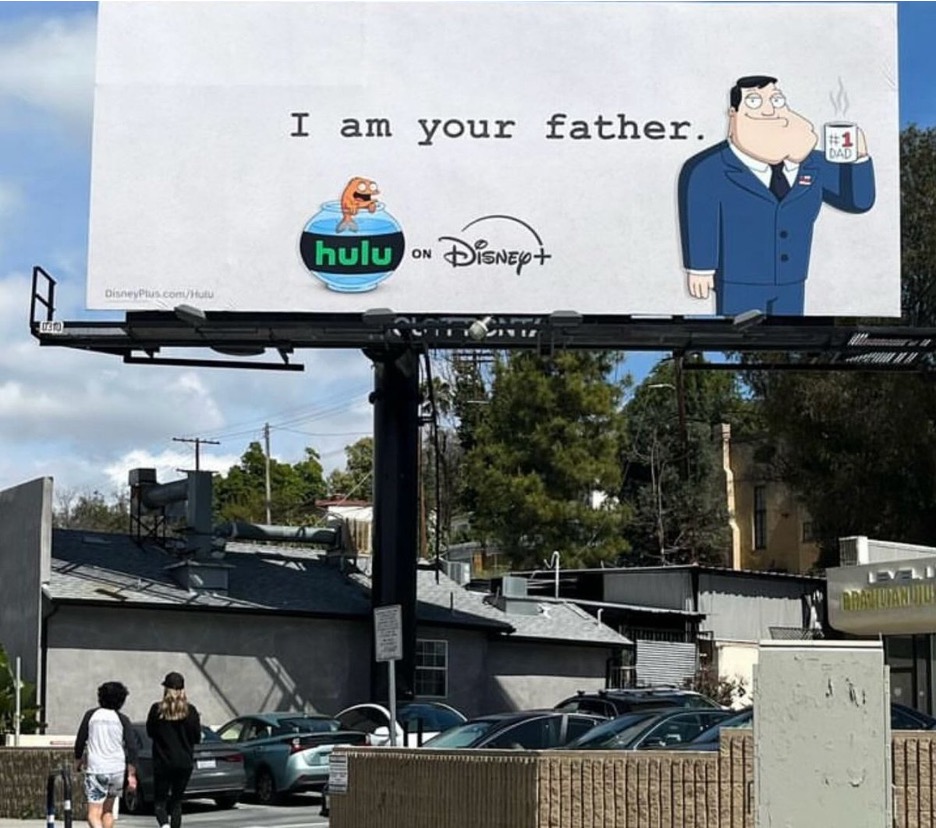 Disney Plus and Hulu billboard featuring Stan Smith and Klaus Heisler from the TBS animated comedy series "American Dad".