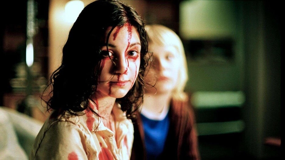 Still image of Lina Leandersson as Eli in the 2008 Swedish romantic horror film "Let the Right One In".