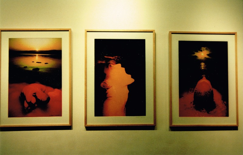 Three photographs by Eshel Ezer of a man coming out of the water. 