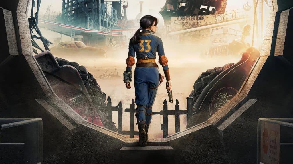 Promotional image from the Amazon post-apocalyptic drama series "Fallout" featuring Ella Purnell as Lucy MacLean wearing a blue and gold jumpsuit with the wasteland in the background.