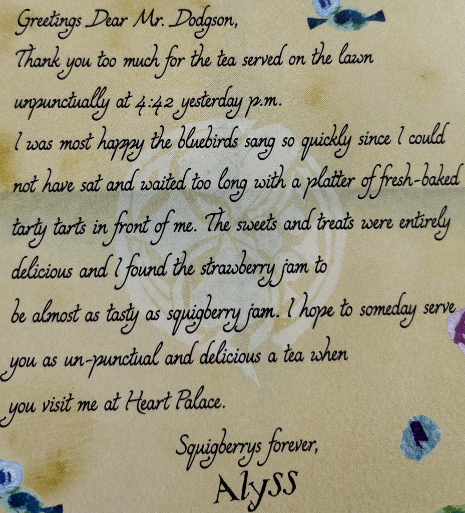 A letter written by Princess Alyss Heart to Charles Dodgson featuring the Suit Families logo, for the book "Princess Alyss of Wonderland". 