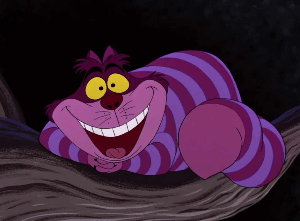 A still image of the grinning, purple striped Cheshire Cat from the 1951 Disney animated movie, "Alice in Wonderland."