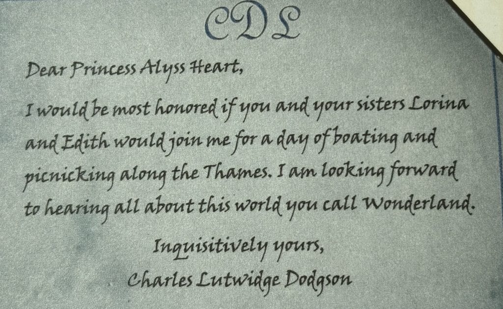 A letter written by Charles Dodgson to Princess Alyss on pale blue parchment with a "C.D.S." monogram, for the book "Princess Alyss of Wonderland". 