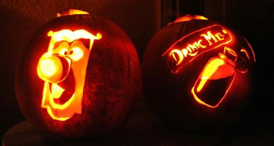 A photograph of a pumpkin carved to depict the Doorknob and the "Drink Me" bottle from "Alice in Wonderland". 